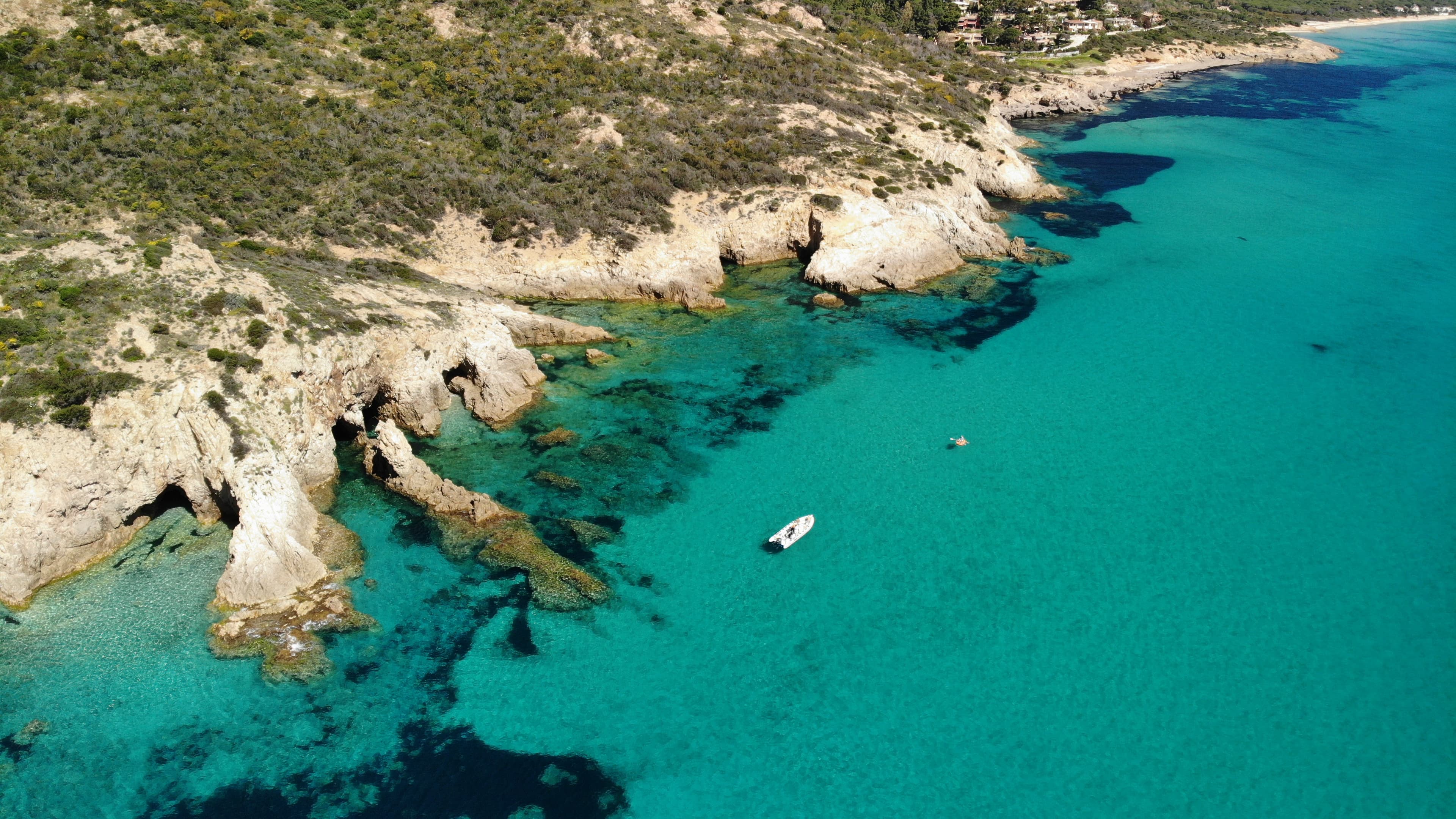 Aerial view of boat near the Sardinian coastline