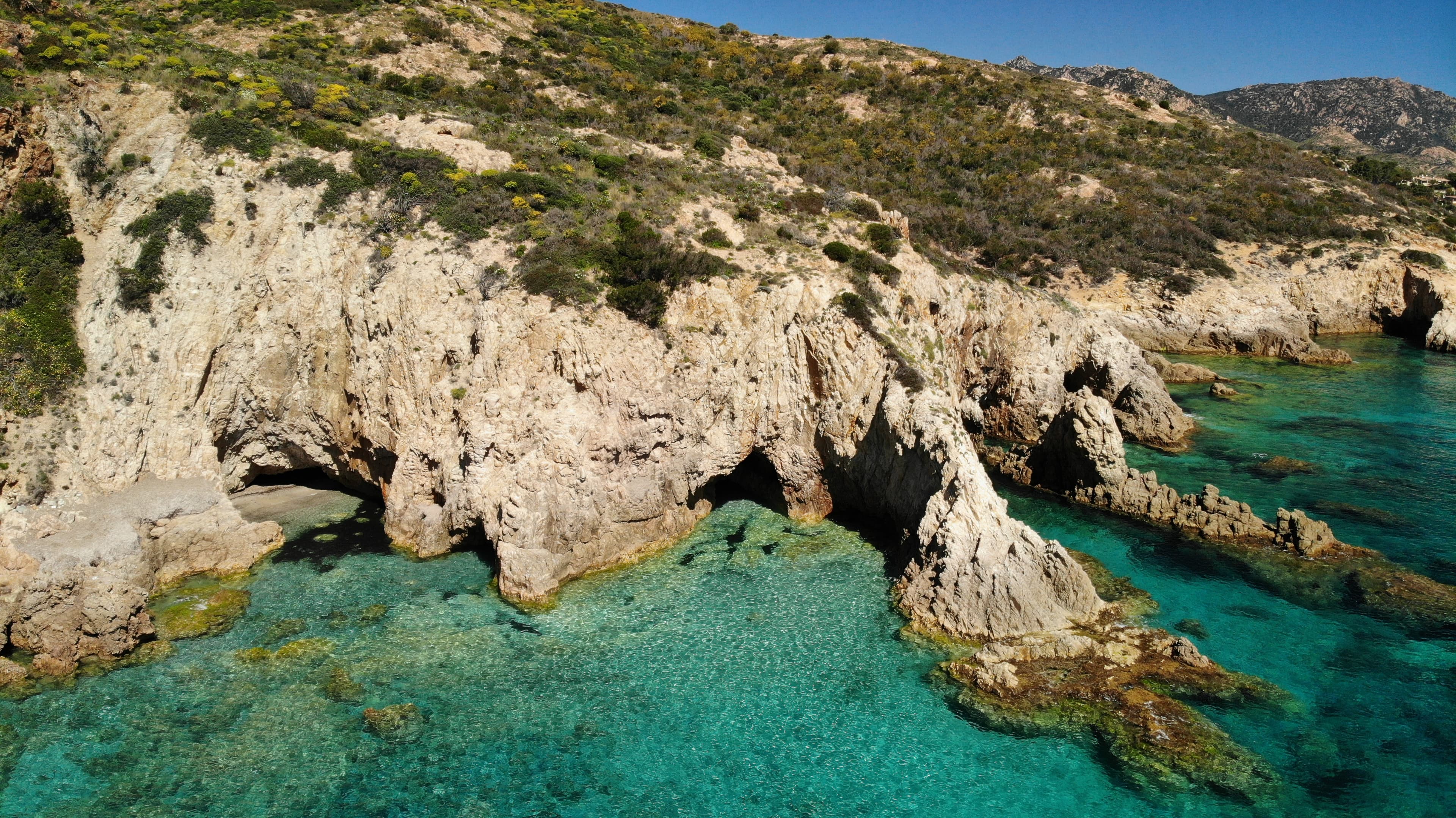 Dramatic Sardinian cliffs rising from the sea